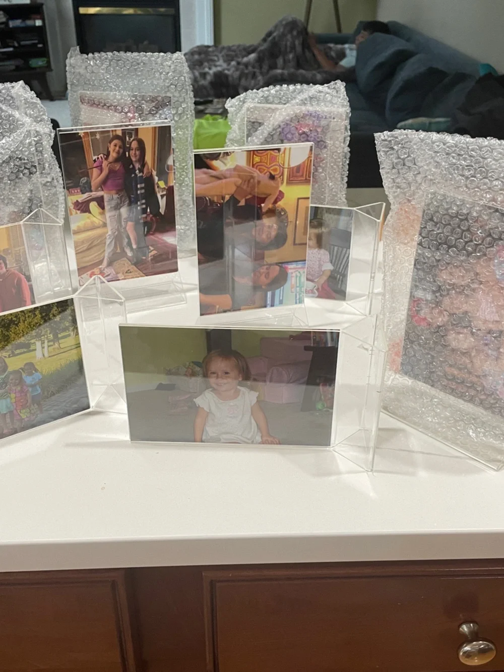 Clear Acrylic Multi-Photo Display Stand includes 12